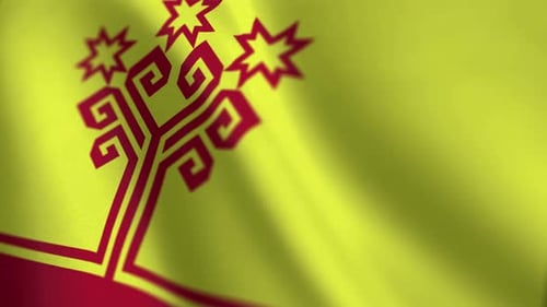 Vibrant Yellow Flag with Artistic Red Emblem Waving