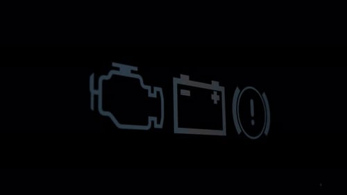 Car Dashboard Warning Lights on Black Background