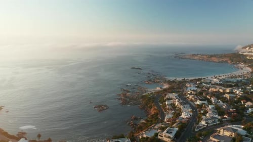 Aerial View Of Coastal Suburb In Camps Bay In Cape Town, South Africa. - Aerial Drone Shot