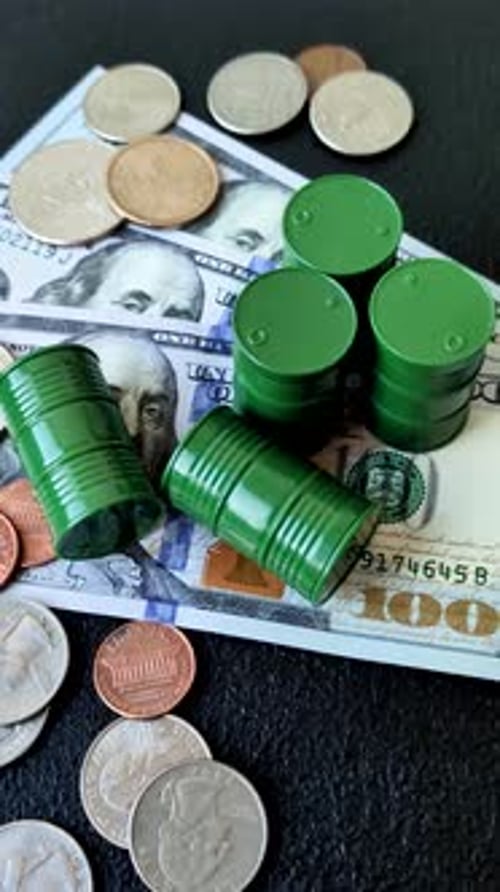 A barrel of oil against a backdrop of dollars as a concept for the oil crisis. A barrel of oil