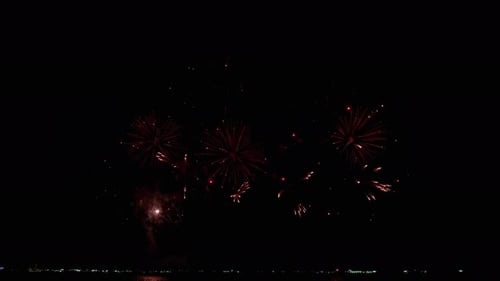 Large number of photos of fireworks during New Year's Eve being shot on the coast