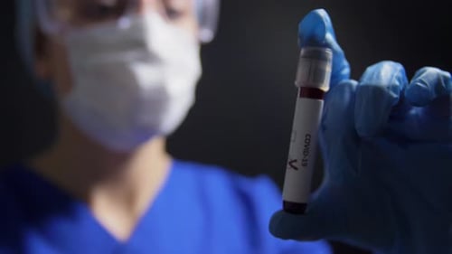 Medicine, Health and Pandemic Concept - Close Up of Young Female Doctor