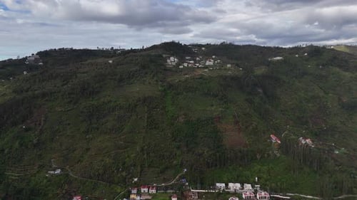 Kodaikanal mountain village embraced by clouds and serenity.