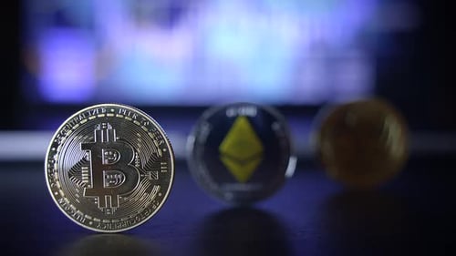 Bitcoin Cryptocurrency Placed Next to Ethereum Coin