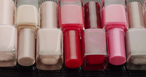 Assorted Nail Polish Bottles in Various Colors Close Up