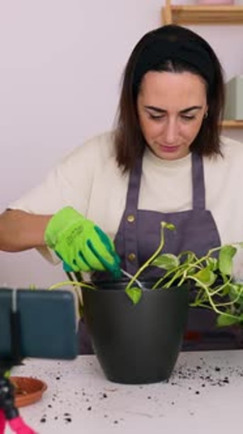 Woman Gardening at Home Recording with Smartphone