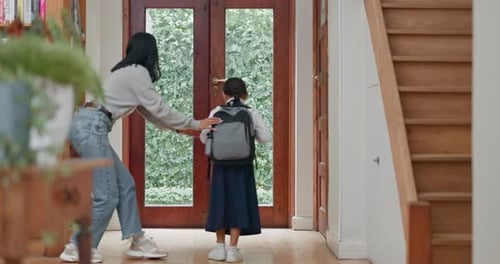 Mother, kid and ready for school in hallway or morning with routine to travel with backpack