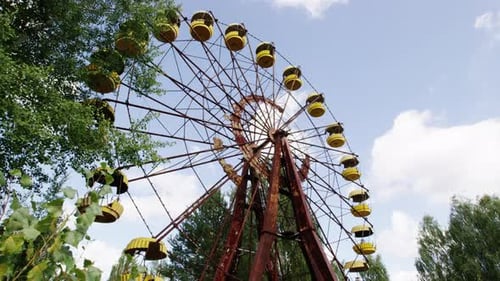 Abandoned Ferris wheel against blue sky in nuclear disaster zone, Pripyat