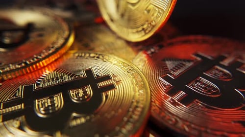 Close up of golden Bitcoin BTC background rotating