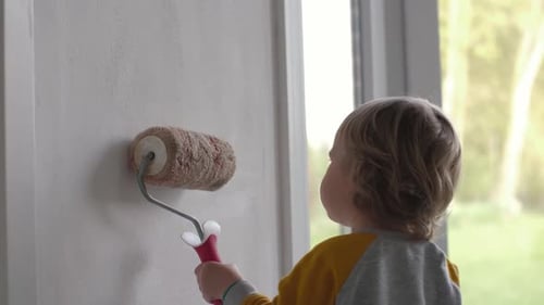 Child Painting Wall