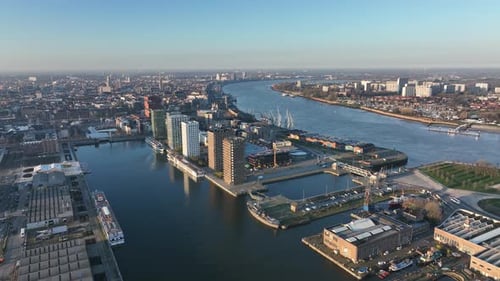 Semi orbit aerial view of Antwerp waterfront skyline