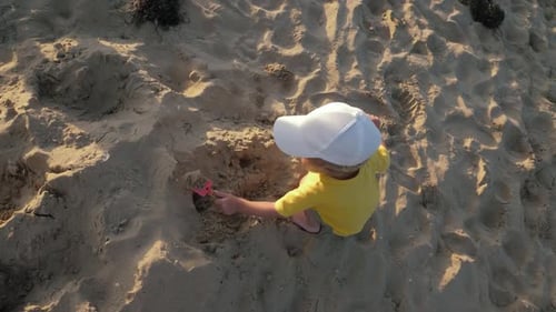 Toddler Playing at Sand Beach