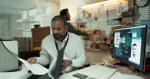 Police, document and men in station, research and planning with evidence for investigation at night