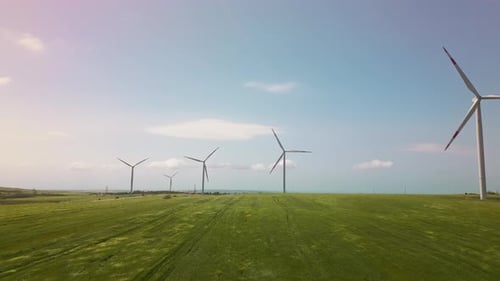 Wind Turbines Generating Clean Energy in Wheat Field