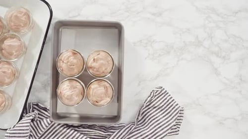 Flat Lay Step By Step Scooping Homemade Chocolate Ice Cream Into Glass Jars