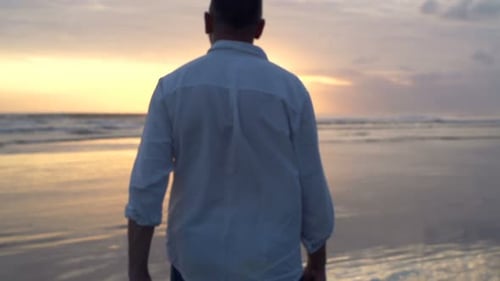 Man Walking On Beach During Sunset, Super Slow Motion 120fps