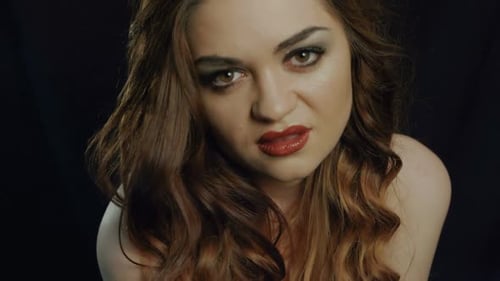 Glamorous Woman Posing with Red Lipstick