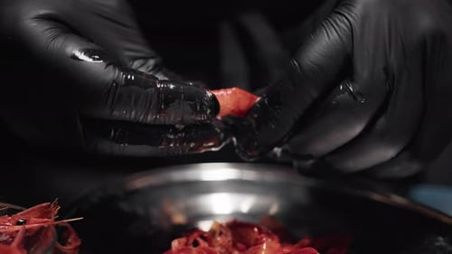 Assistant Chef Prepares Prawn Crudite Fish Into Restaurant