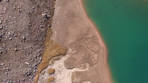 The Emerald Color of the Water of a Mountain Lake