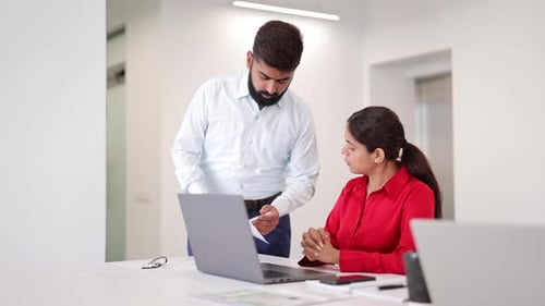 Professional Indian Team Working on Laptop