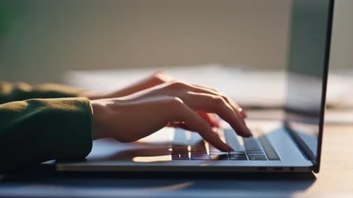 Woman Hands Typing on Keyboard Modern Laptop Close Up. Unrecognisable Girl Freelancer