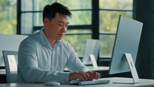 Mature Asian Businessman Chinese Korean Office Worker Specialist Male Work on Computer Develop