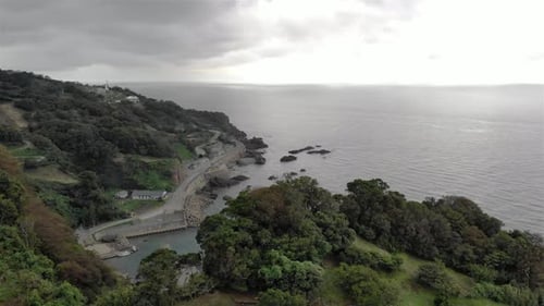 Mountains forest and small village in the sea of Japan- Aerial