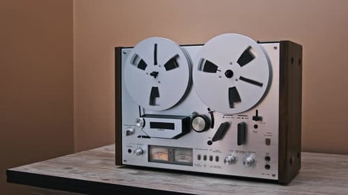 Vintage Reel to Reel Recorder Playing Tape