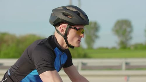Close Up of Cyclist Doing Workout on Bicycle Outdoors