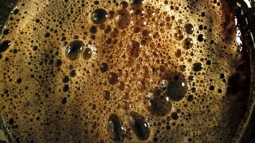 Foam with Black Coffee Top View Filmed on a Highspeed Camera at 1000 Fps