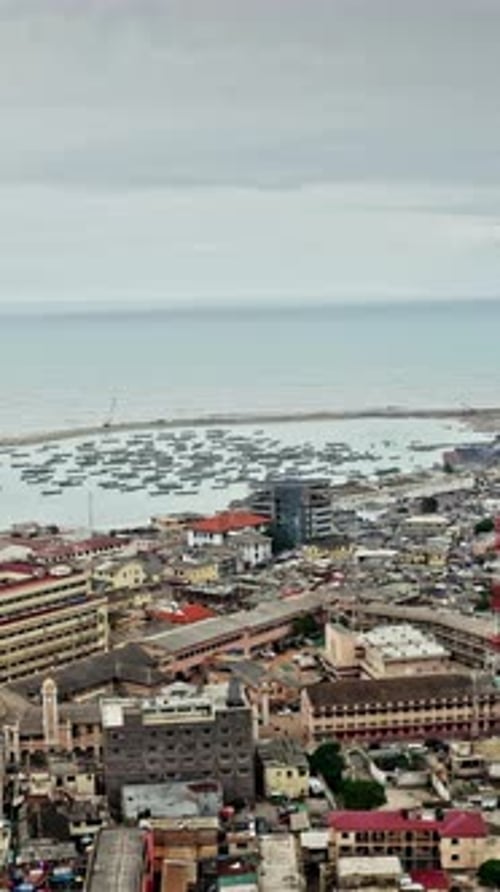 Aerial view of coastal cityscape in Accra, Ghana at dawn