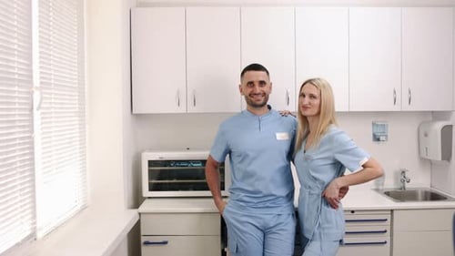 Dental Professionals White Cabinets Clinic Setting