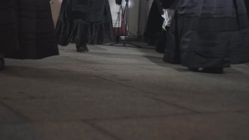 Feet Dancing in Traditional Folk Costume on Stage