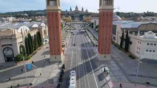 A long panoramic view of Venetian Towers and Magic Fountains on Avinguda de la Reina Maria Cristina