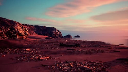 Calm Pinkhued Beach Featuring Small Reflective Pools and Tranquil Ambiance