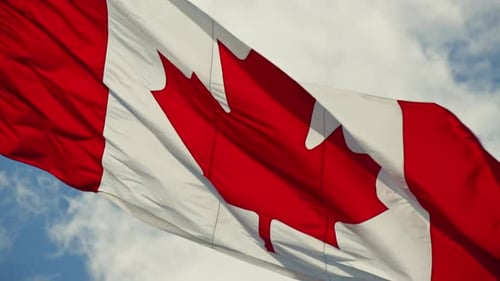 Canadian Flag Waving on Windy Day