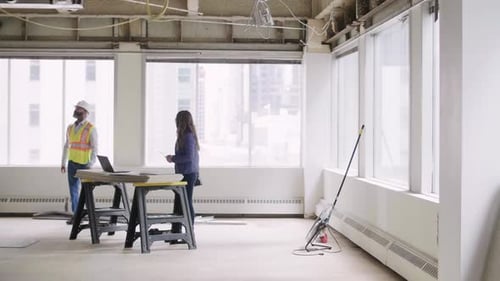 Of Construction Foreman and Architect Planning Office Remodel