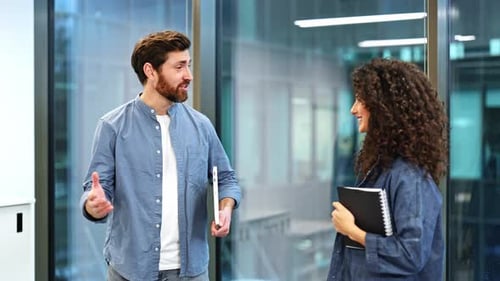 Business Colleagues High Five Celebrating Success and Teamwork in a Modern Office