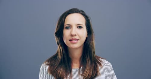 Woman Smiling in Close Up Portrait Studio Shot