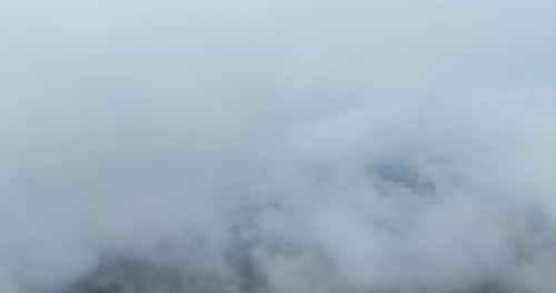 Aerial View Above Misty White Clouds