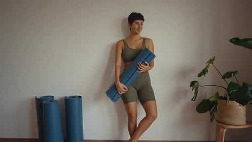 Beautiful young woman exercising yoga
