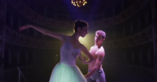 Ballet Couple Dancing Passionately on Theater Stage