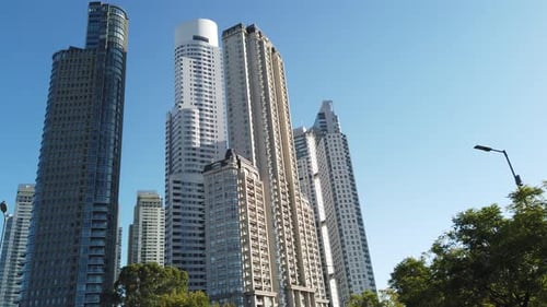 Low angle view, Skyscraper buildings over Sunrise skyline of Buenos Aires city Argentina