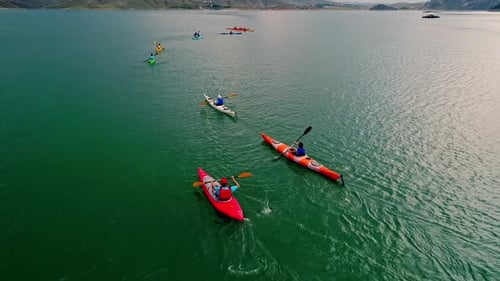 People Kayaking on a Lake Aerial View