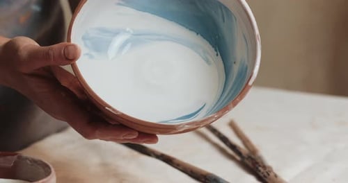 Skilled Potter Glaze Covers the Cup From Red Clay Close Up Process Ceramic Workshop
