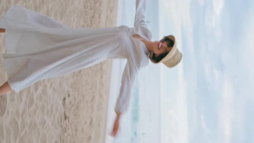 Joyful Model Dancing Beach on Cloudy Day Vertical Happy Woman Enjoying Summer