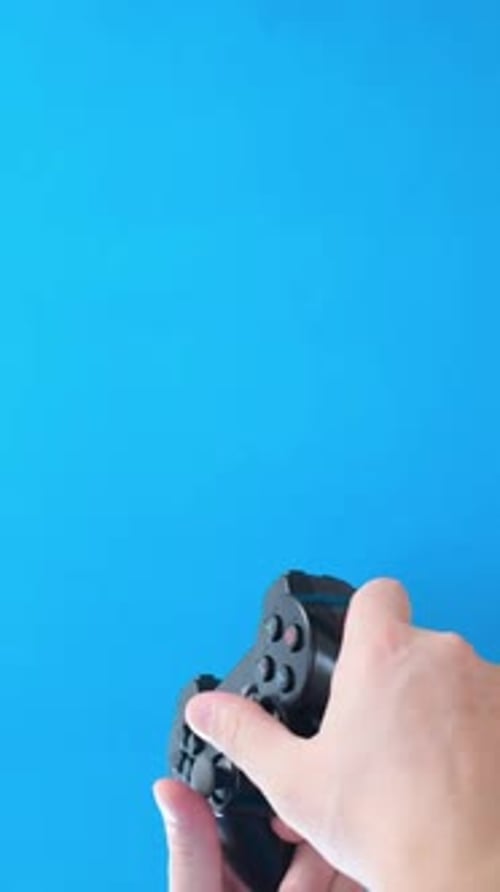 Game Console on a Blue Background Vertical Video