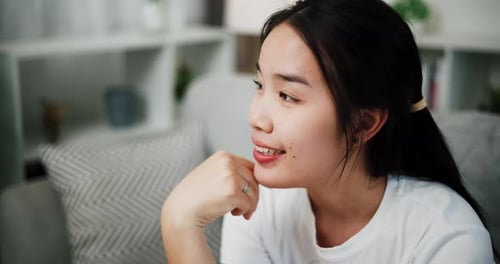 Smiling Woman Resting Indoors