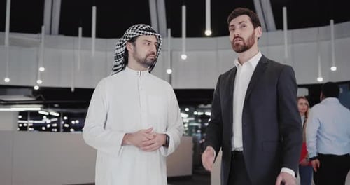 Businessmen Meeting: Collaboration in Modern Corporate Office