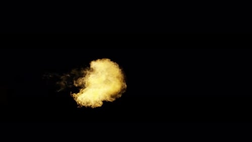 Ignite Collection: Brief expel of a huge fireball from left to right in center on dark background, s